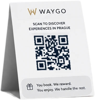 The Waygo card on a hotel desk: scan to discover experiences in Prague